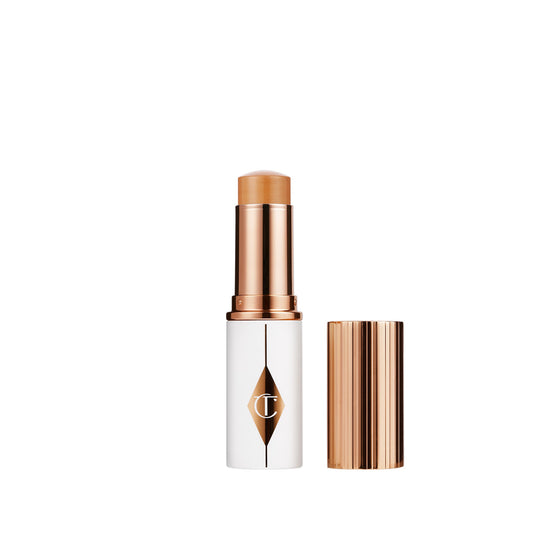 Charlotte Tilbury Unreal Skin Sheer Glow Tint - 9 Tan