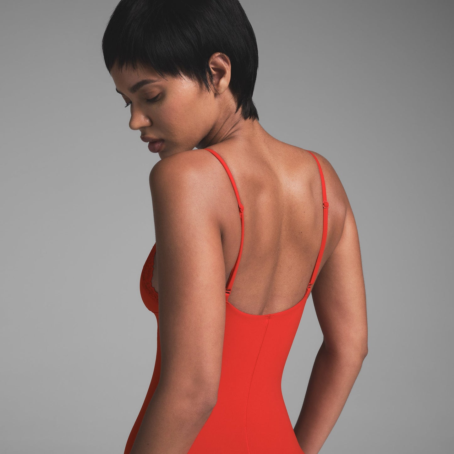 SKIMS Fits Everybody Lace Triangle Onesie